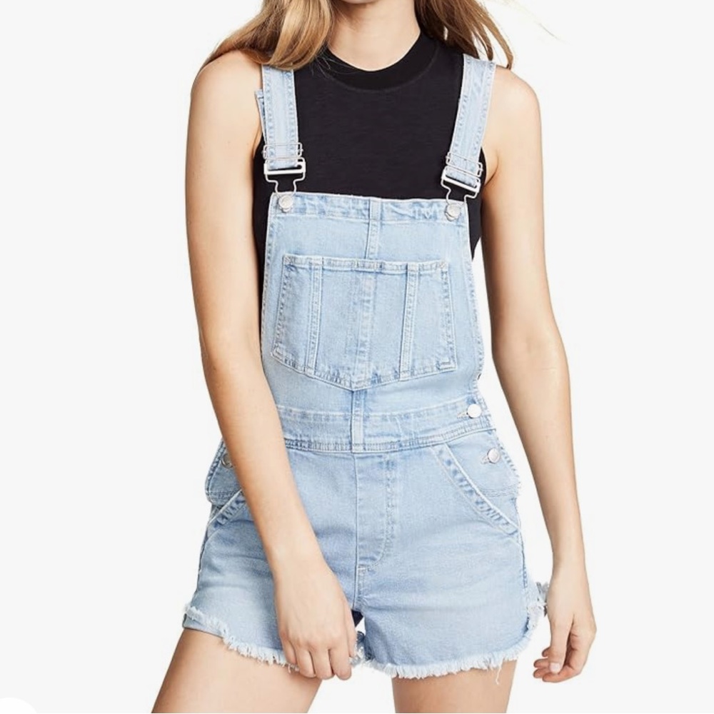 Cute denim romper is brand new with tag.